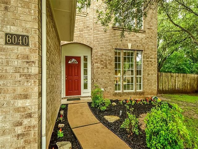 Welcome home to 6040 Bel Fay lane. This home is in a quiet cul-de-sac and backs to a greenbelt!