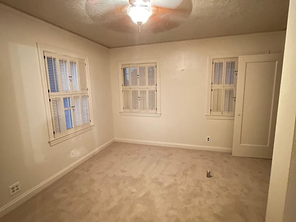 Upstairs bedroom with 2 closets and stained glass window (see next photo)