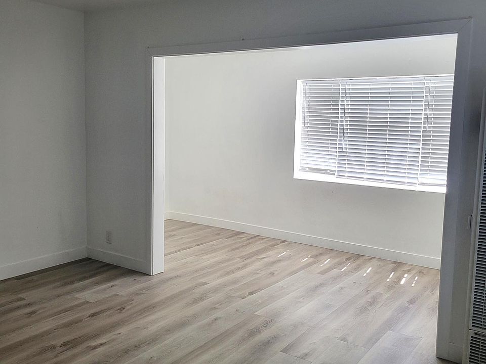 living room with sunny alcove