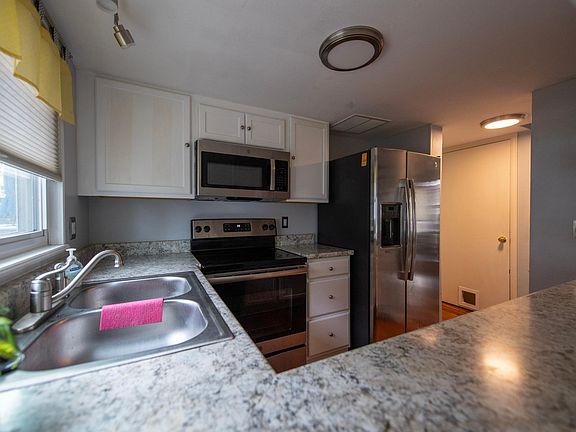 Kitchen with new, stainless steel appliances