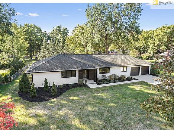 Enjoy a large, flat, Leawood lot