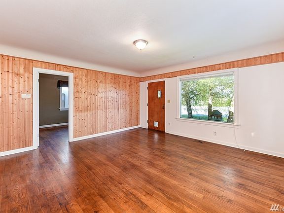 Living Room leading to first bedroom