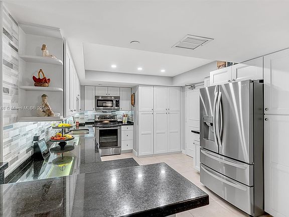 3rd image of 3200 Port Royale Dr N APT 308