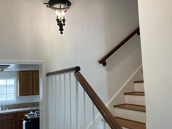 Stairs Leading to Upstairs Bedrooms and Bathrooms
