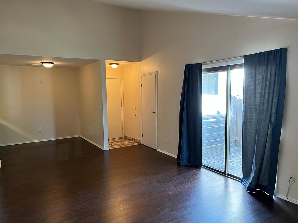 Entrance and Living room with sliding door to deck access