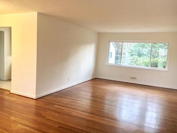 Living room with refinished hardwood floors