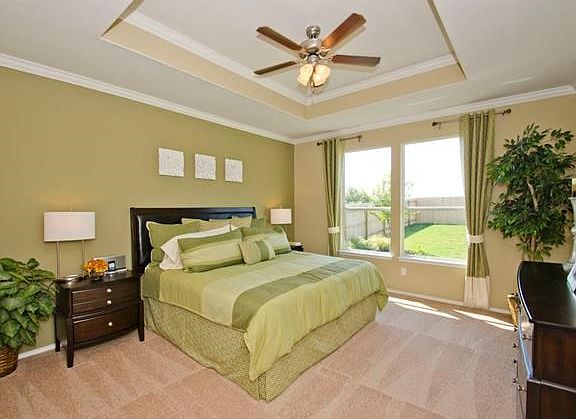 Photo of Model Home with Same Floor Plan, Not of Actual Home Listed