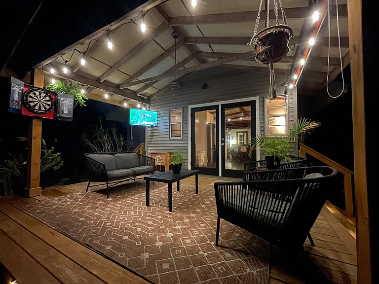 Back Patio/Deck. TV, Dart Board included.

(Not current furniture)