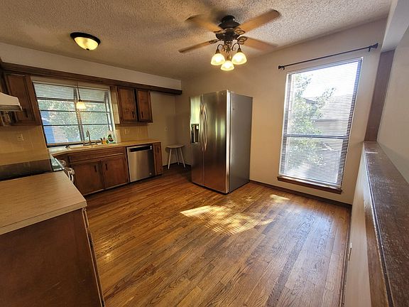 Kitchen with large LG refrigerator