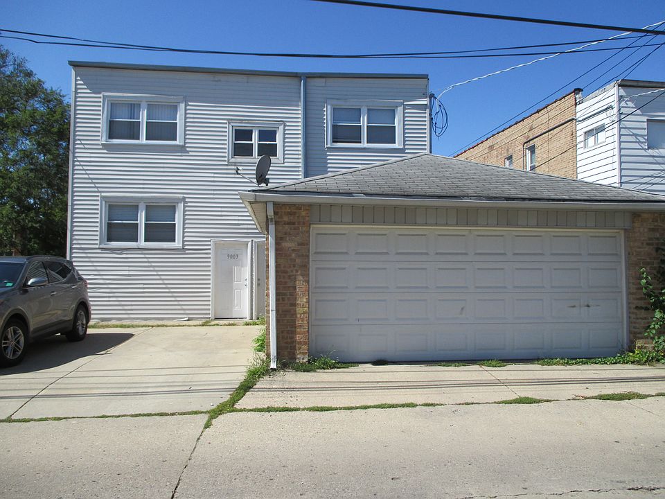 GARAGE & PARKING IN THE BACK