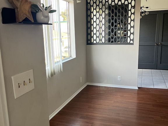 Bright, welcoming entrance with spacious storage closet to the left.