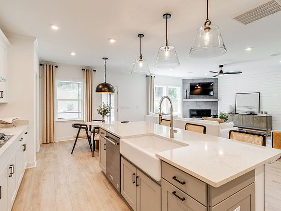 Gourmet Kitchen with a large island including a farm bowl sink.