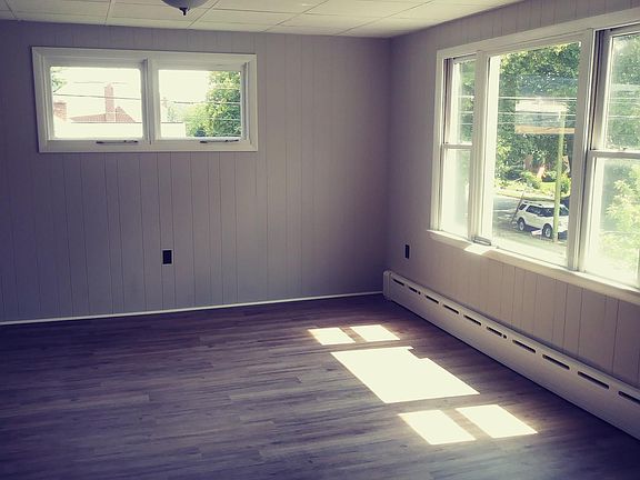 Another view of the 13.5 x 21 dining room with lots of windows and new A/C