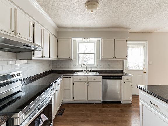 Great kitchen and cupboard space. New range installed and ready for family meals. Fridge recently upgraded as well .