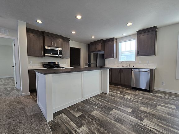 2nd image of 7204 E Grand River Ave Lot 408
