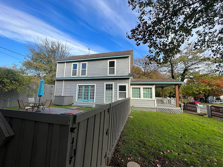 Enter through front door or through the courtyard. Nice and spacious property!