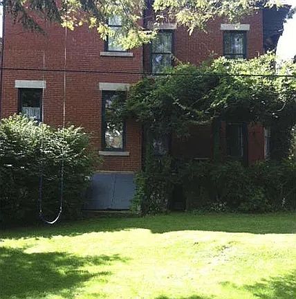 Rear yard looking back to house nad terrace off of kitchen