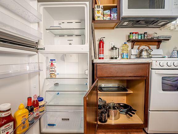 Pots, pans, silver wear, toaster oven, and more are provided for a seamless transition