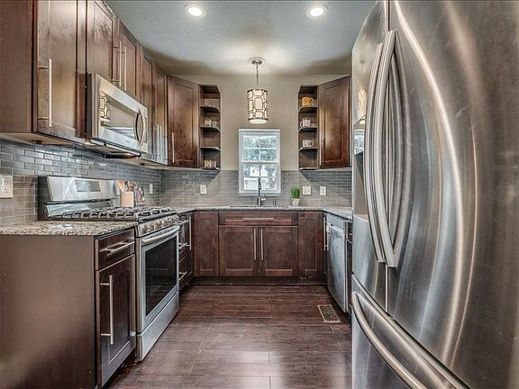 Kitchen

Includes fridge, microwave, oven, stove top, dishwasher, and an abundance of storage.