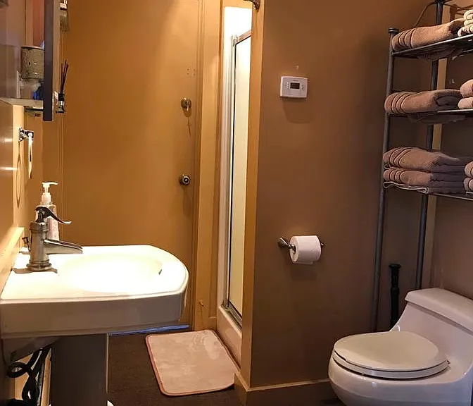 Entry level bathroom with shower.