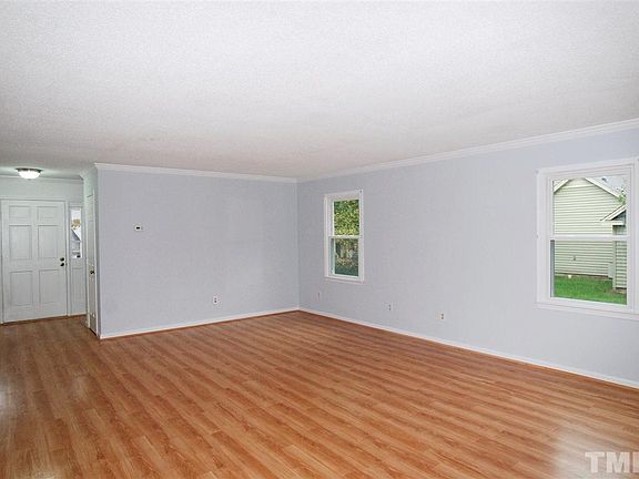 Entry Foyer opens to the Large Family Room & also has a Door that opens to the Kitchen.