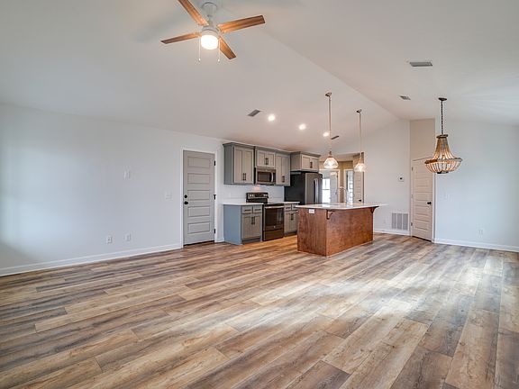 open floor plan, main living space/kitchen/dining