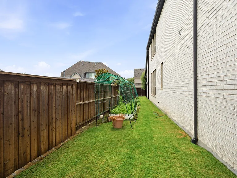 Side Yard with Raised Garden Bed