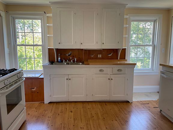 kitchen sink between windows