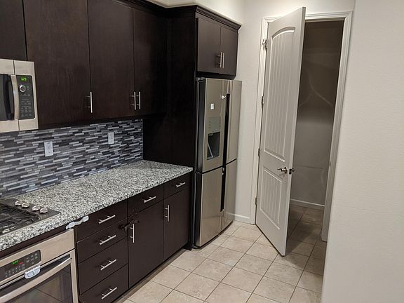 Fridge and access to laundry