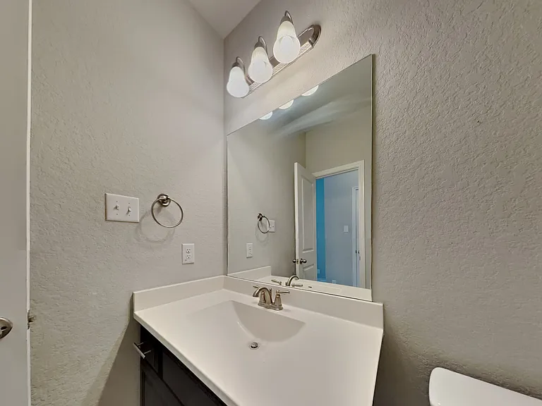 This bathroom features a sleek