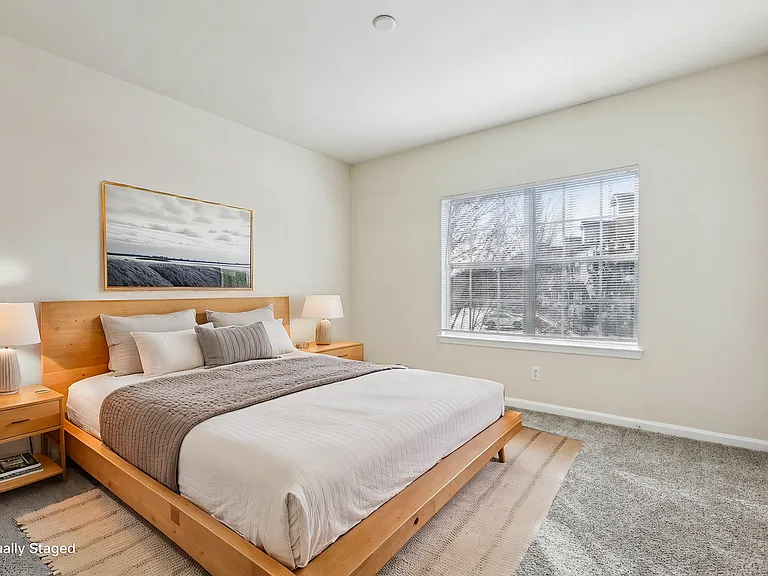 Experience tranquility in this beautifully staged bedroom with abundant natural light. Experience tranquility in this beautifully staged bedroom with abundant natural light.