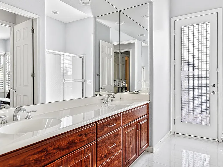 JACK & JILL BATHROOM BETWEEN DEN AND ONE OF THE TWO GUEST BEDROOMS