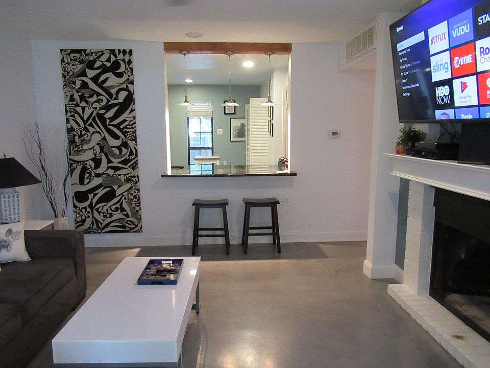 Living room looking into kitchen.