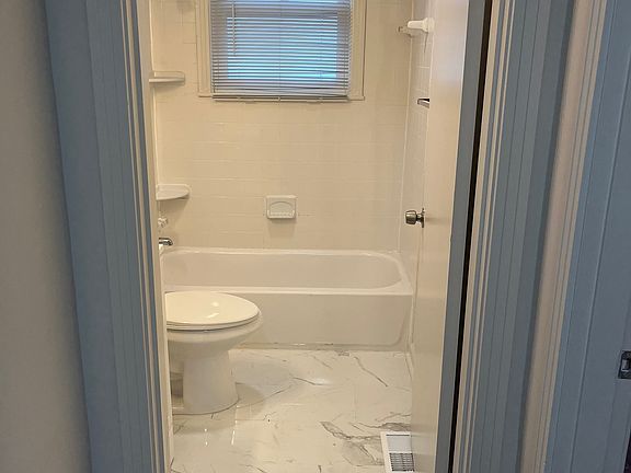 Updated bath with shower / tub combo