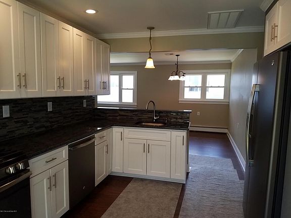 open concept kitchen to dining room