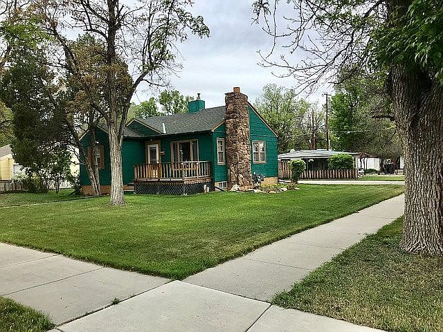 Home with rental in rear.