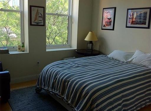 Large BR w/ large windows & high ceilings