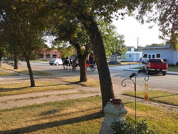 school on left and church on