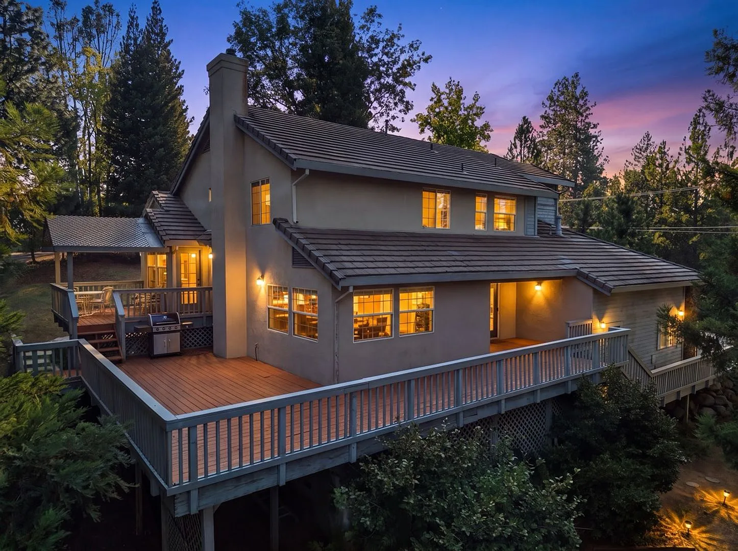 4-Bedroom Home with Wraparound Deck, 3-Car Garage & Private Setting! — Photo 2