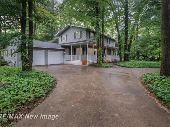 928 W Francis Shores Ave, Sanford, MI 48657