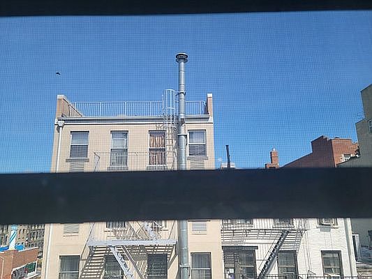5th image of 255 E 10th St APT 5D