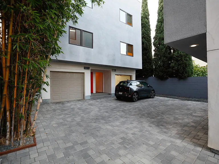 Central Motor Court with Paver Stones Leading to Garage Entrance