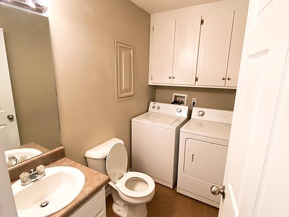 half bath with laundry on the first floor