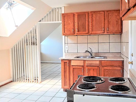 Eat in kitchen with skylight and adjacent bonus room area