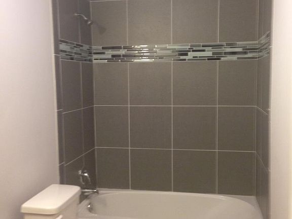 Newly Tiled bathrooms with all brand new fixtures!