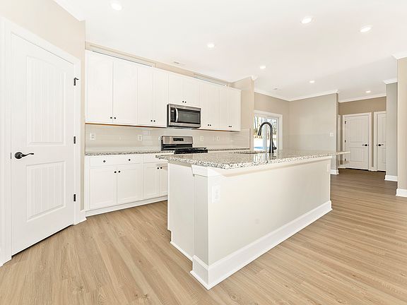 The kitchen comes with granite countertops