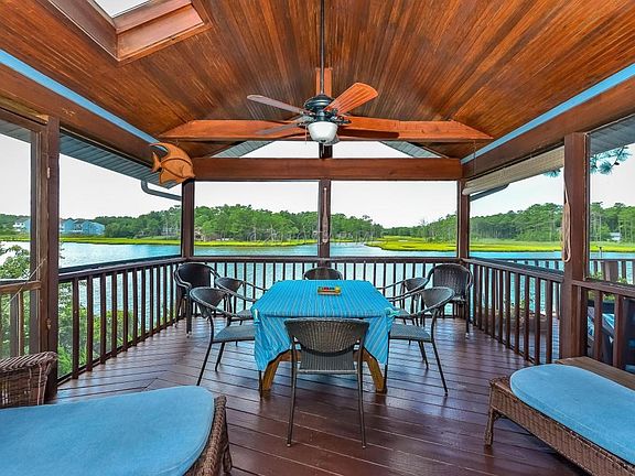 Expansive Waterfront Covered Porch