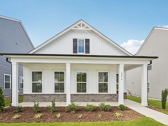 Exterior - Classic siding and a breezy coastal palette.