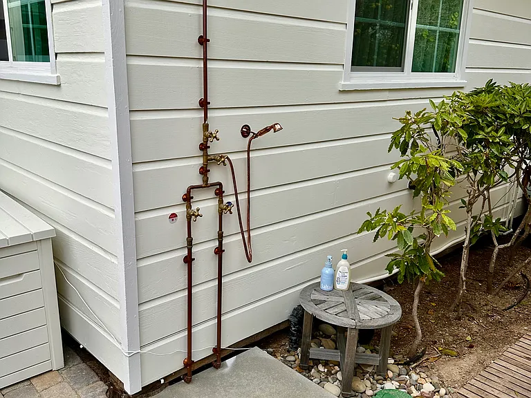 Brand new outdoor shower with hot and cold water.