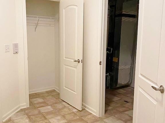 Entry vestibule- coat closet and laundry room